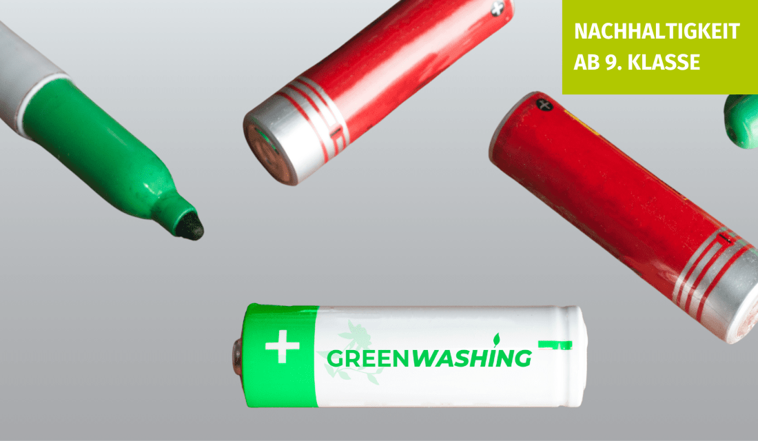 zwei rote und eine grüne Batterie auf der "Greenwashing" steht