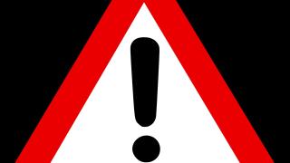 Warnschild mit Ausrufezeichen